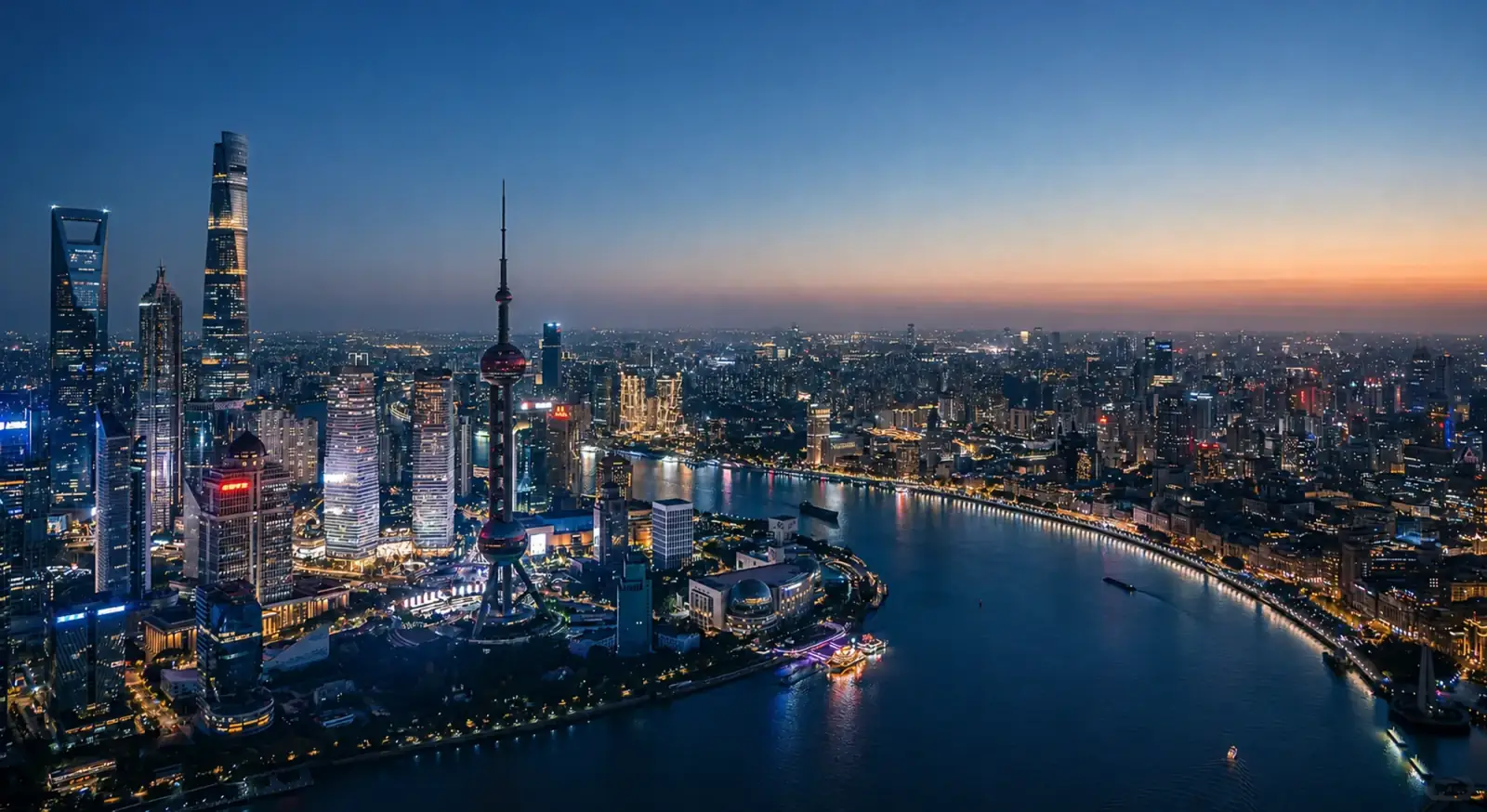 Shanghai's Lujiazui skyline and the Huangpu River at blue hour